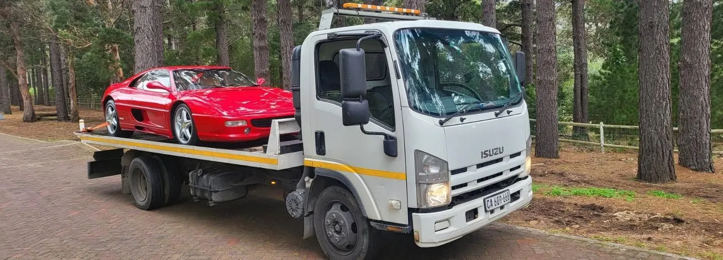 Down South Towing flatbed recovering a vehicle